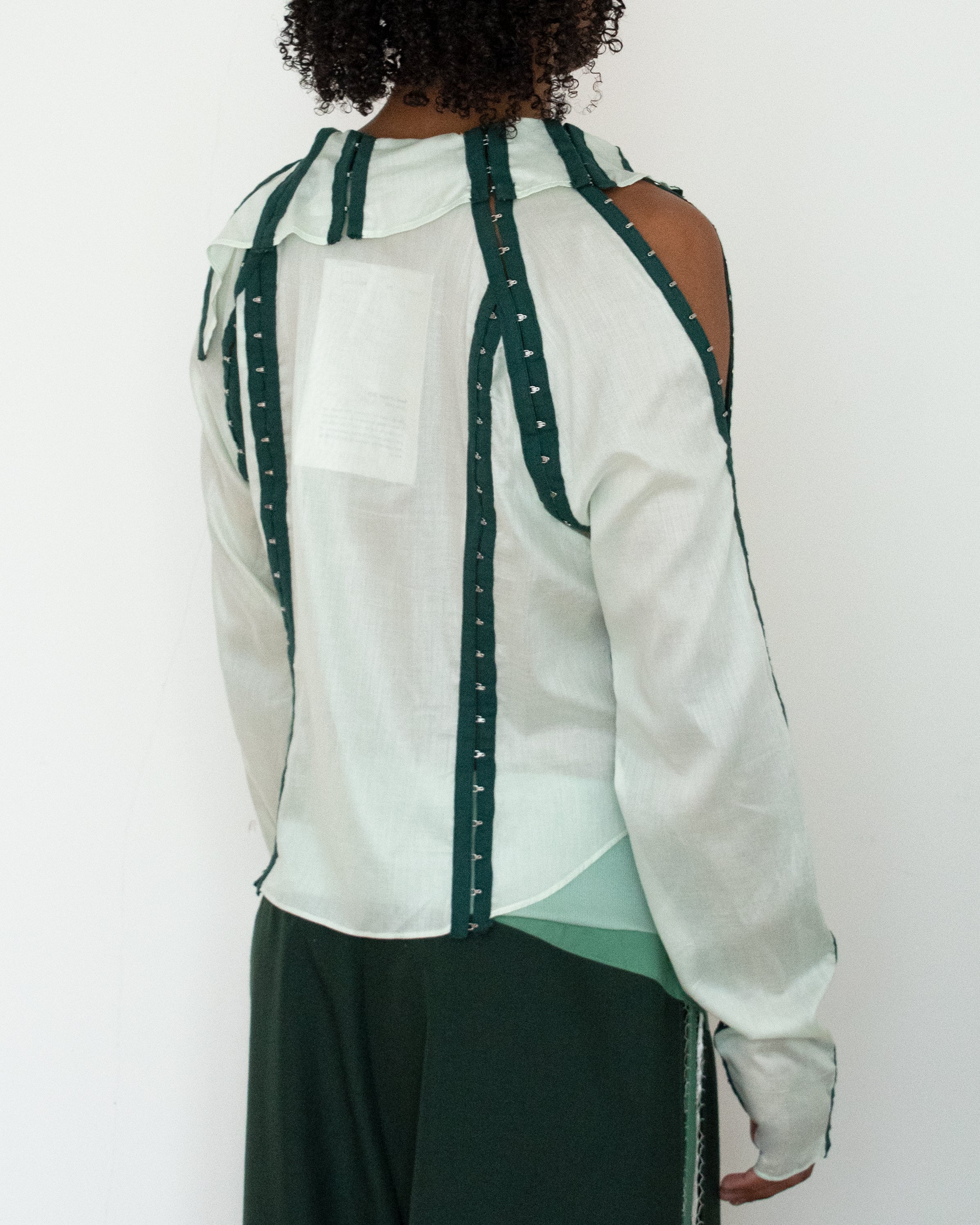 Hook and eye tape shirt